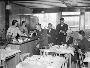 Sir CHarles Burdett and Baroness Poppy Rednig Von Trebnitz run restaurant in the city