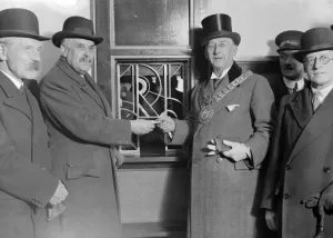 Royal Families Prints: Sir Josiah Stamp, 2nd from left, handing the first ticket issued at the New London Midland