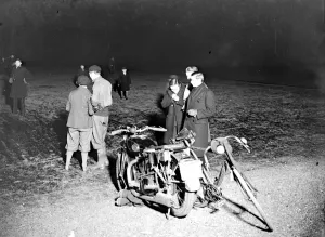 Smoking Prints: Skating and cyclists in Keston, Kent, at night. 1933