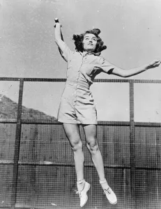 The sky is the limit. Fay Wray, the Hollywood film actress, grits her teeth