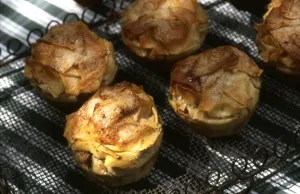 Apples Prints: Small apple and filo tarts on cooling tray credit: Marie-Louise Avery / thePictureKitchen