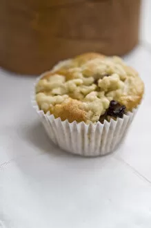 Bake Off Inspiration Collection: Small currant muffin topped with grated apple credit: Marie-Louise Avery / thePictureKitchen