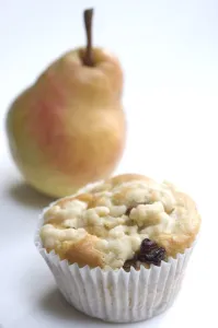 Small currant muffin topped with grated apple credit: Marie-Louise Avery / thePictureKitchen