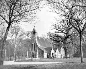 The Small Royal Chapel, typical of any English country church, nestles among trees