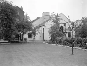 The small white building is Londons only back garden theatre, The Mermaid. Founded