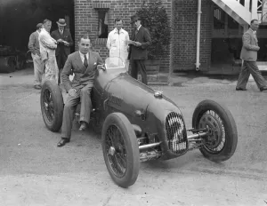 Smaller driver has smallest car for season fast race. Famous racing drivers, including