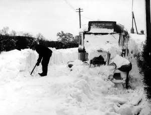 People Prints: Snow up on the roof of this bus at Cudham, Kent. Two other buses suffered the same fate