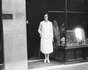 Society beauty opens a shop Mrs Dudley Coats standing in the door way of 10, Davies Street