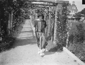 Young Woman Prints: Society on the Golf Links at Le Touquet. The Honourable Mrs Earle on her way to the links