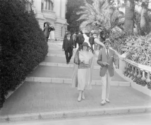 Society at Monte Carlo. Captain and Mrs Noel Sampson on the Terrace at Monte Carlo
