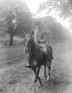 Society in the Park. Viscount Churchill riding in the Row. 23 May 1924