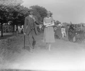 Walking Prints: Society At Roehampton. Lord Burgh with a Lady Friend 21 May 1921