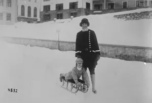 Society at St Moritz. The Hon Mrs Franck Curzon with her little daughter. 5 February