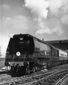 Railway Prints: The Southern Region Atlantic Coast Express steams out of Waterloo Station on its