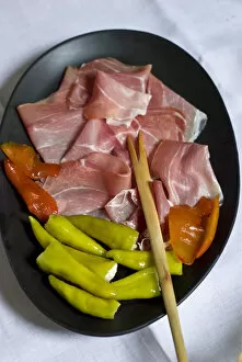 Plates Collection: Spanish Serano dried ham with stuffed, green, chilli peppers and Hawaiin pickled mango