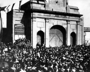 Spectators outside the East India Dock gates watching the opening of the Blackwall