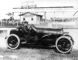 Leather Jacket Prints: Spencer Wishart in his 1913 Mercer car which he competed in the 1913 Indianapolis 500