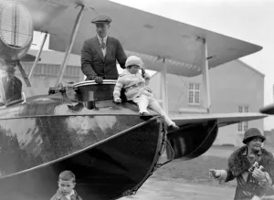 Father Prints: Squadron Leader Archibald Stuart MacLaren and his daughter standing in the Vickers