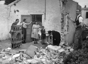Living Conditions Prints: Squatters home demolished while they were still living in it. Mr. L. Ingram