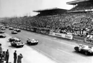 Race Prints: At the start of the Le Mans Grand Prix, British racing driver Stirling Moss leads