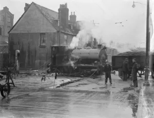 Smoke Prints: A steam train pass by through the level crossing in Westwood Erith, London, where