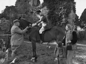 1940s Prints: Stirrup Cup for the master. At the meet of the East Sussex Foxhounds today (Wednesday)