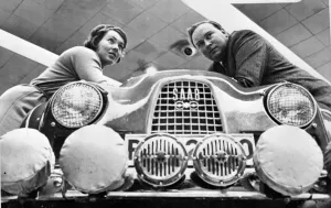 Stockholm, Sweden : Pat Moss - Carlsson and husband Erik Carlsson, nursing a Saab