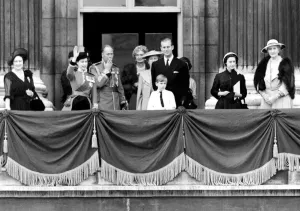 The strain of the hour long ceremony over, the Duke of Gloucester smokes a cigarette