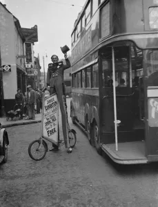 Eccentric Prints: Stunt cyclist Tom Longley demonstrates his skills just outside the Dartford Co op, Kent