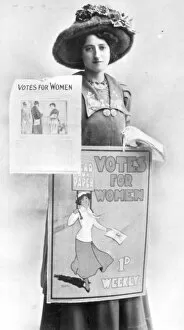 Suffragette Collection: A Suffragette selling Votes for Women posters