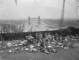 London Life Prints: Summer siesta - on Londons roof-garden. With the River view of the busy Pool of London