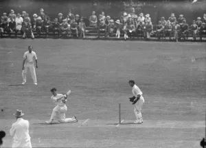 Surrey versus Sussex at Brighton. M Howell ( Surrey ) playing forward to a delivery