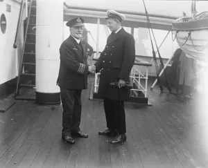 Disaster Prints: Survivors of the sinking liner horror. Captain Day being congratulated on board by his son
