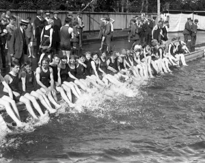 Swimmers Prints: Swimmers making a splash at Tonbridge open air swimming baths. 23 June 1920