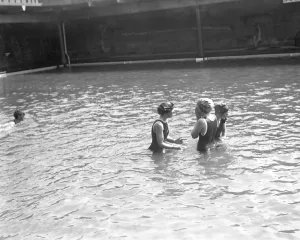Swimmers in the open air swimming pool at Westcliff - on - Sea, Essex