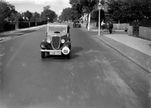 Taking part in a car rally. 193