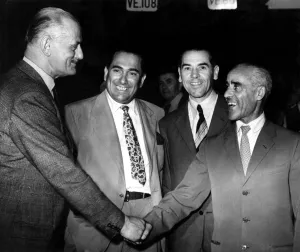 Tazio Nuvalari, the Italian motor racing veteran - greeted by Lieut Col Goldie Gardner