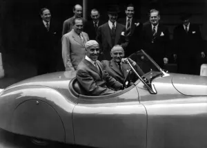 Tazio Nuvalari, the Italian motor racing veteran - seated at the wheel of the super