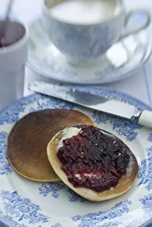 Bake Off Inspiration Collection: Teatime setting with scotch pancakes and raspberry jam credit: Marie-Louise Avery
