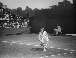 Sport Prints: Tennis at Wimbledon. Mrs McIlquham in play. 29 June 1929