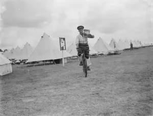 Preparation Prints: Territorial Army recruits at camp in Chichester, Sussex. Fetching water on a bicycle