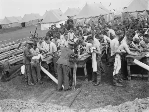 Territorial Army recruits at camp in Lympne, Kent. Washing in the open