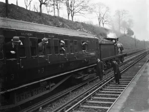 Testing electrified railway lines by steam train in Swanley, Kent. 1938