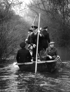 Rescue Prints: Thames Floods. Police of the Metropolitan River Squad brought a portable boat