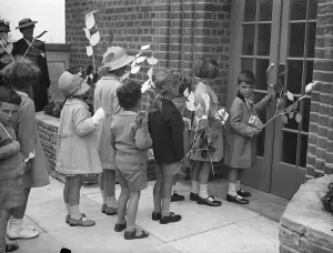 Thomas, son of the novelist J. B. Priestley, unlocking the Sherborne Nursery School