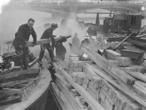 Wood Collection: Timber barge on fire at Vauxhall, London