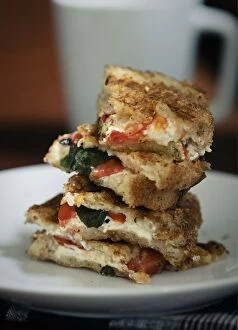 Foods Collection: Toasted sandwich of gluten free bread with goats cheese feta, tomatoes and basil