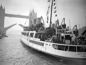 London Prints: At Tower Pier. Royal Daffodil leaves on her maiden trip to Ostend. 27 May 1939