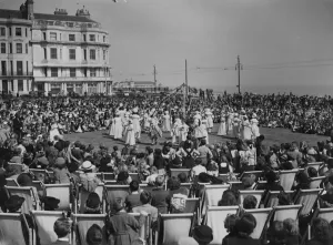 Spectators Prints: Traditional Maypole dancing on the lawn at Warrior Square, Hastings, Sussex, was