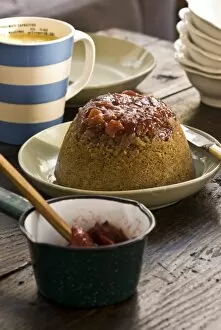 Bowl Collection: Traditional steamed sponge pudding with walnits and rhubarb compote and custard